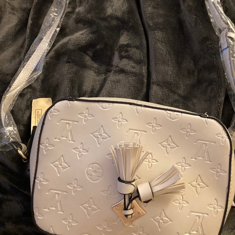 Louis Vuitton cream hand bag
